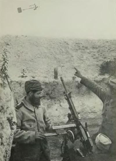 <i>Photo by Western Newspaper Union</i> French Hotchkiss Gun Firing at Aeroplane