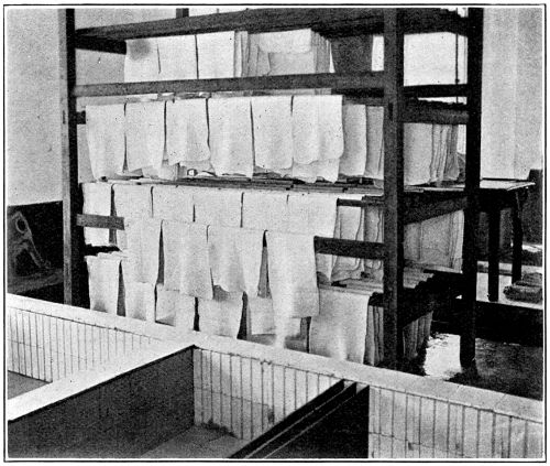 The Old Method of 'Dripping' Freshly Rolled Sheets within the Factory