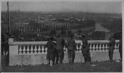 SO THIS IS PARIS A. E. F. Boys, guests of our A. R. C. in its great hospital at St. Cloud, look down about the "Queen City of the World"