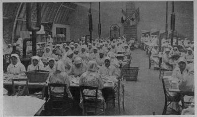 BANDAGES BY THE TENS OF THOUSANDS An atelier workshop of the A. R. C. in the Rue St. Didier, Paris, daily turned out surgical dressings by the mile