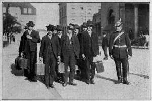 Photograph from Brown Brothers, N. Y. A LEVY OF FARMER BOYS OFF FOR THE BARRACKS The fact that millions of food-producers of this type were taken from the soil caused Central Europe to run short of life's necessities.