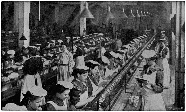 Ladies packing bacon in jars