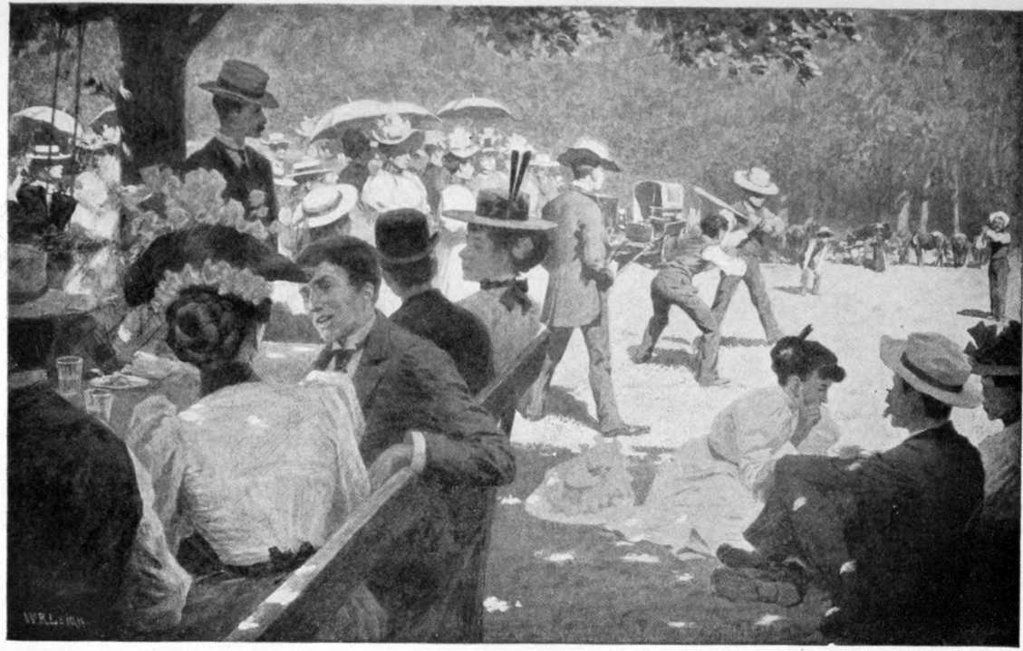 A sunny day at the fairgrounds with many men and women sitting and standing. There is a baseball game in the background.