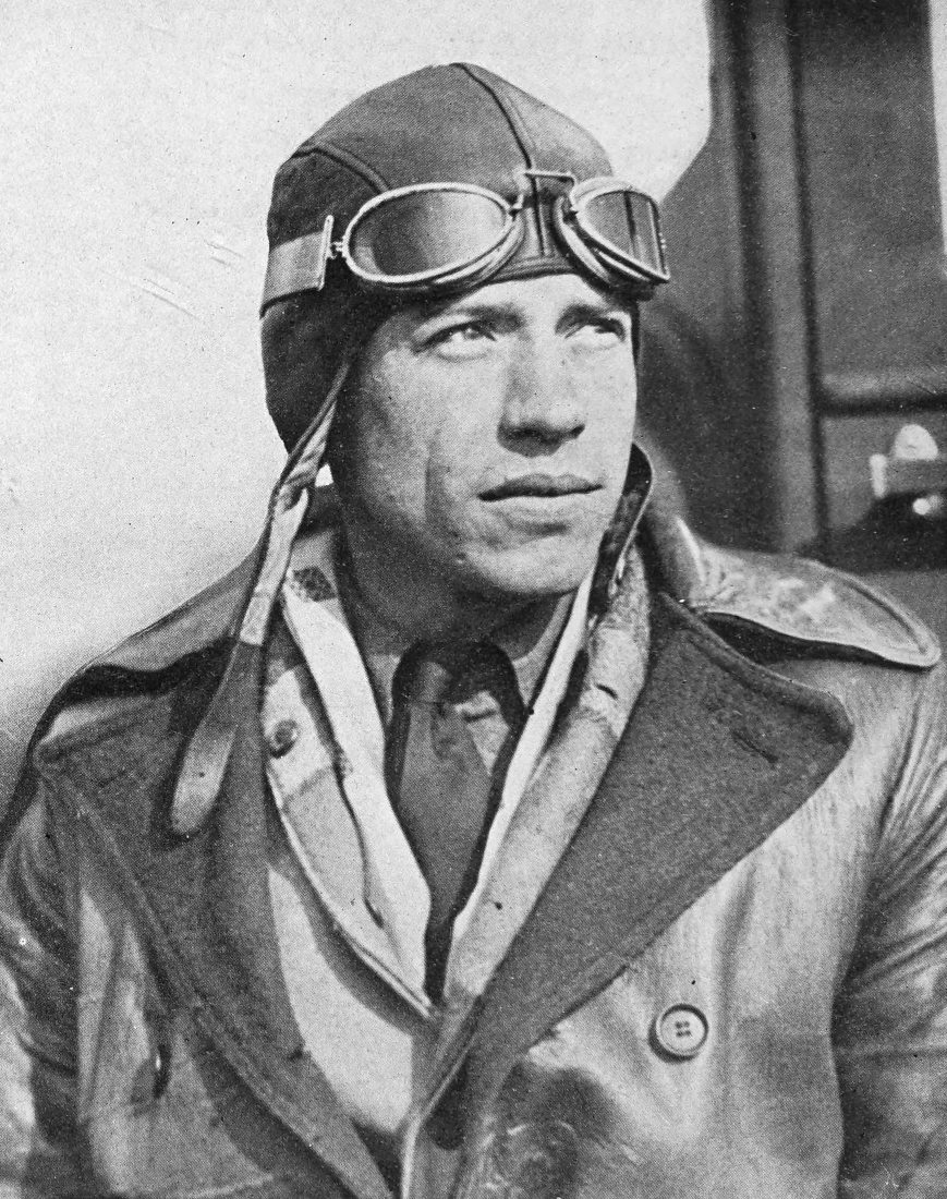 Photo close medium 3⁄4 view shot outdoor portrait of Wilmer Stultz wearing flight gear