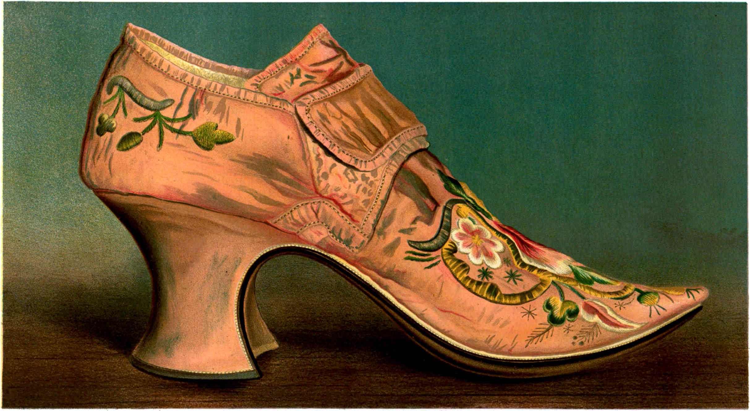 A pink high-heeled shoe with a pointed toe, decorated with floral embroidery and a large folded strap across the front.