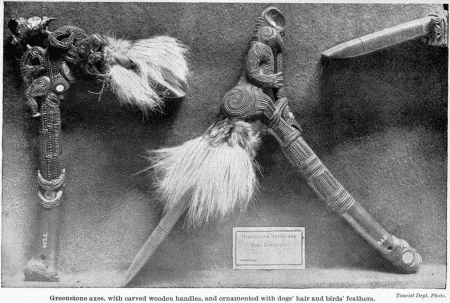 Tourist Dept. Photo.

Greenstone axes, with carved wooden handles, and ornamented with dogs'
hair and birds' feathers.