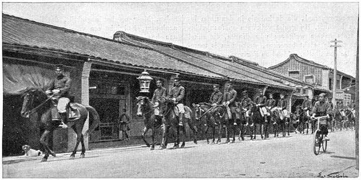 Japansche ruiters in een straat der hoofdstad, Ta&iuml;hokoe.