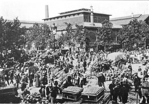 THE HALLES CENTRALES, PARIS

An Outside View, Showing How the Supplies Overflow into the Adjacent Streets, Notwithstanding the
Provision of Twenty-two Acres of Covered Pavilions.