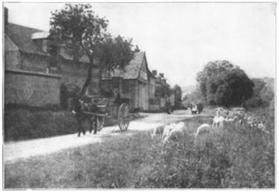 A QUAINT STREET IN A LITTLE FRENCH VILLAGE FAR FROM THE
ROAR OF CITIES