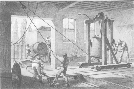 F. Jones, lith from a drawing by R. Dudley

London, Day & Sons, Limited, Lith.

THE REELS OF GUTTA PERCHA COVERED CONDUCTING WIRE CONVEYED INTO TANKS AT
THE WORKS AT GREENWICH.