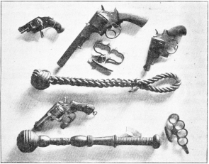 CRIMINALS’ WEAPONS: REVOLVERS, KNUCKLE DUSTERS, AND LIFE
PRESERVERS IN THE BLACK MUSEUM.

Photo: Cassell & Company, Limited.