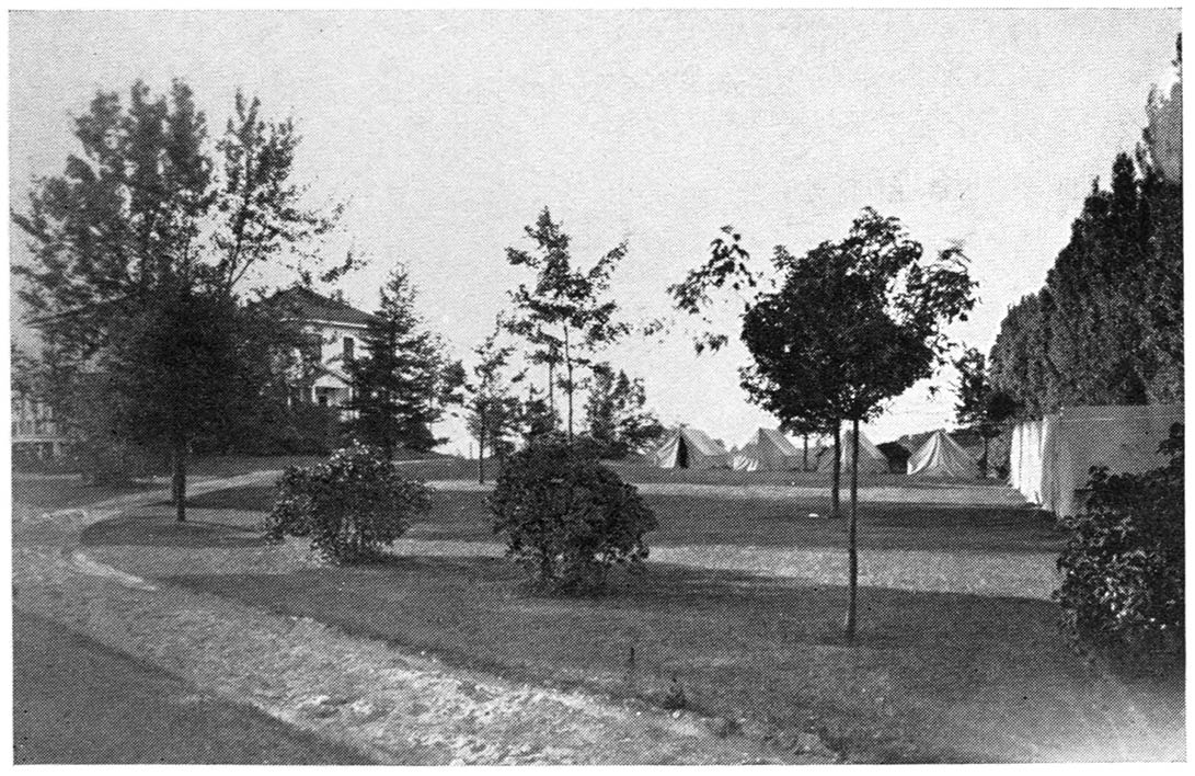 Hotel building at Orchard Beach State Park, Michigan. Note
the tents provided for motor campers, rented at lower
than room rates to those taking their meals at the hotel